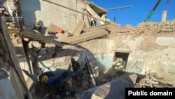 Наслідки обстрілу гімназії в Нікополі 11 жовтня, внаслідок якого загинули четверо людей