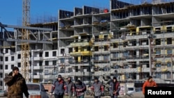 Російське будівництво в окупованому та зруйнованому Маріуполі, лютий 2023 року
