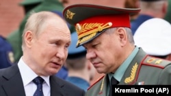 Владмимр Путин и Сергей Шойгу