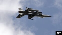A Pakistani F-16 fighter performs during the celebrations to mark the country’s Defence Day at the Nur Khan military airbase in Islamabad on September 6, 2015.
