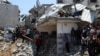 Urmările unui atac israelian asupra unei case, în Jabalia, Gaza. 23 mai 2025. 