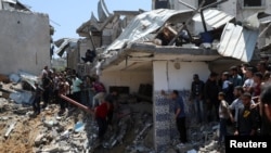 Urmările unui atac israelian asupra unei case, în Jabalia, Gaza. 23 mai 2025. 
