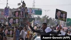 FILE: Supporters of former Pakistani Prime Minister Nawaz Sharif attend a rally in Gujrat city in the eastern Punjab province.