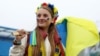 Ілюстраційна світлина. Юна вболівальниця української збірної перед відбірковим матчем Чемпіонату світу з футболу між Україною і Уельсом. 2022 рік