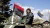 Боєць добровольчого батальйону «Донбас» у Широкині. Квітень 2015 року