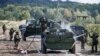 Українські військовослужбовці відпрацьовують прийоми дезактивації техніки під час спільних з НАТО військових навчаннях Rapid Trident 2017, Львівська область, 15 вересня 2017 року