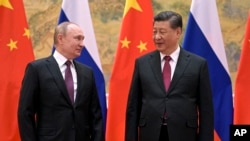 Лідер Китаю Сі Цзіньпін та очільник Росії Володимир Путін 