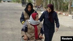 یکی ا زمجروحان در اردوگاه اشرف