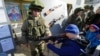 Дети знакомятся с оружием и военной техникой на праздновании российского «Дня защитника отечества». Симферополь, 23 февраля 2020 года