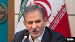 اسحاق جهانگیری میگوید، فرض را بر این گذاشت که سیل می‌آید و مدیران باید آمادگی داشته باشند. (عکس از آرشیو)