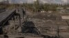 Зруйнований міст та пошкоджені будівлі у Покровську, 15 жовтня 2024 року