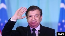 Uzbek President-elect Shavkat Mirziyaev speaks to his supporters in Tashkent on December 5.