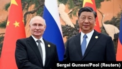 Очільники Росії і Китаю: Володимир Путін і Сі Цзіньпін 