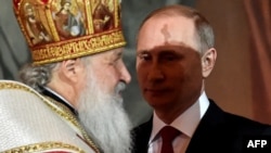 Президент Росії Володимир Путін (праворуч) і Московський патріарх Кирило. Москва, 1 травня 2016 року