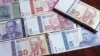 Таносуби 20 ба 80: пули нақд дар дасти мардум мемонад 